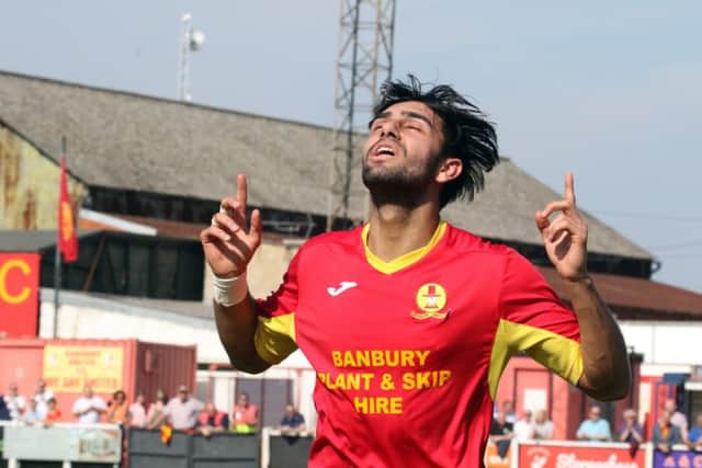Ravi Shamsi celebrates after equalising for Banbury United against Bedworth United. Photo: Steve Prouse