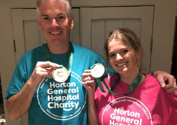 Tom and Millie Purton with their Paris Marathon medals. Photo courtesy of Horton General Hospital Charity NNL-190424-101704001