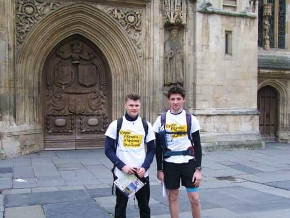 Henry and Dominic ready to start their walk outside Bath Abbey