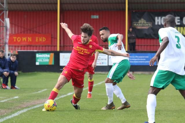 Giorgio Rasulo keeps the ball in play during Banbury United's defeat against Hitchin Town. Photo: Steve Prouse NNL-190427-174335002