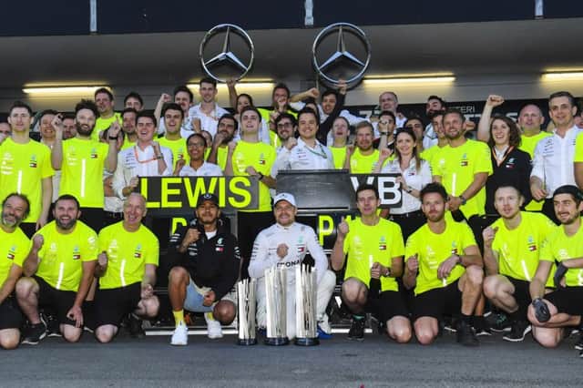 Lewis Hamilton and race winner Valtteri Bottas celebrate with the Mercedes AMG Petronas team NNL-190429-130411002