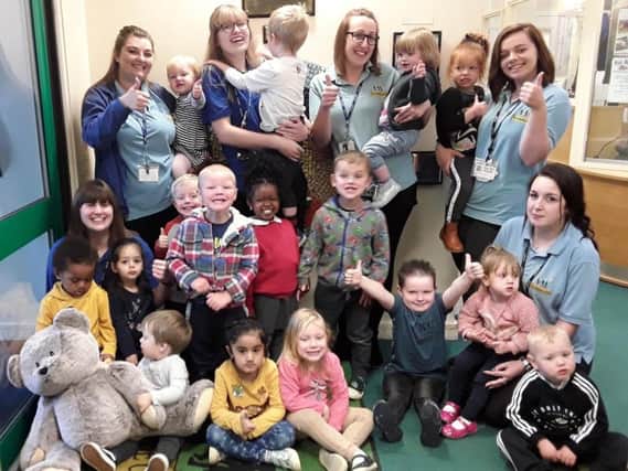 Children and staff celebrate at the Sunshine Centre in Bretch Hill
