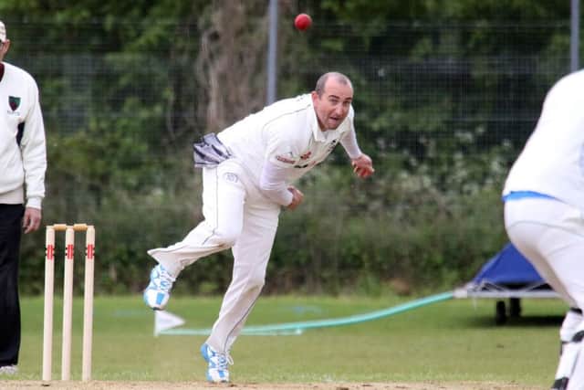 Middleton Cheney bowler Steve Wilkes sends down a delivery against Oxenford