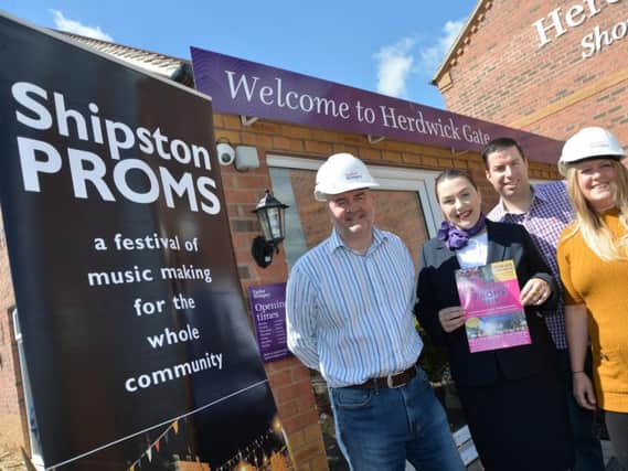Representatives from Shipston Proms and Taylor Wimpey Midlands celebrate the donation. Photo: Taylor Wimpey Midlands
