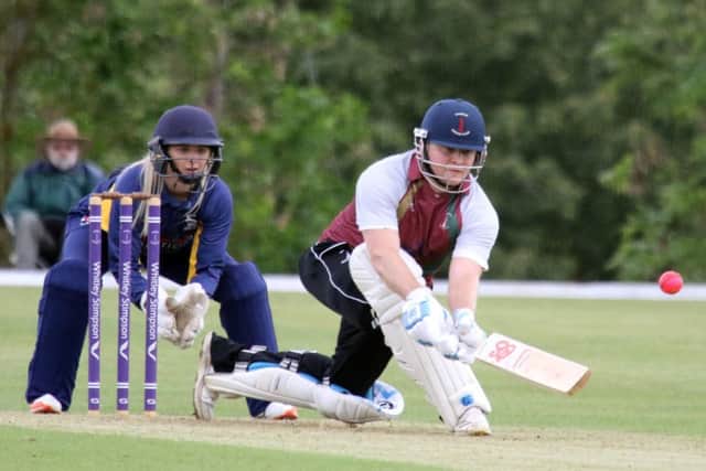 Banbury's Ed Phillips deals with another delivery as Tring Park wicket keeper Chloe Hill looks on at White Post Road. Photo: Steve Prouse