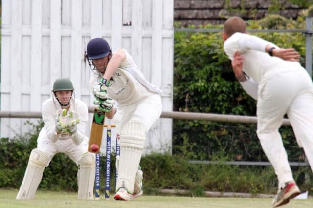 Westbury century-maker Olly Tice deals with a delivery from Buckingham Town II bowler Matthew Thatcher as wicket keeper Alex O'Dell looks on. Photo: Steve Prouse