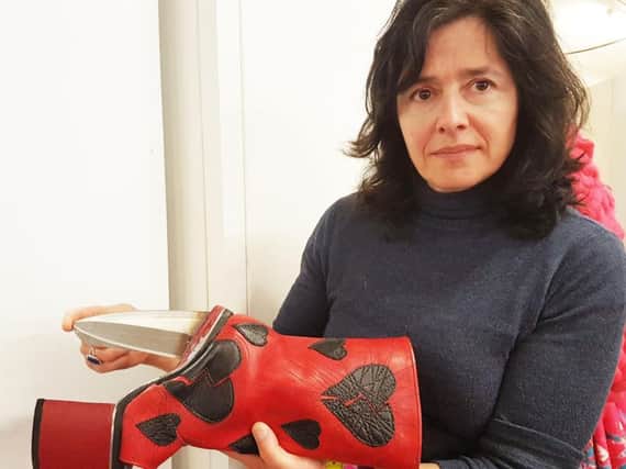 Jo Allen with the boot she has designed