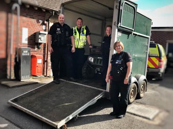 Police officers with the stolen horsebox and quad bike found in Whitfield. Photo: Northamptonshire Police