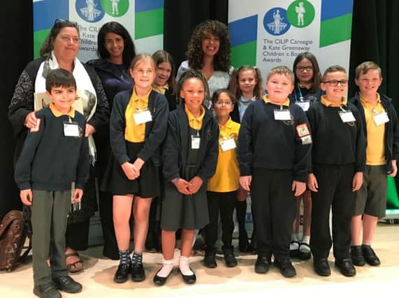 Hanwell Fields Community School pupils and staff with judges at the 2019 CILIP Carnegie and Kate Greenaway Childrens Book Awards. Photo: United Learning
