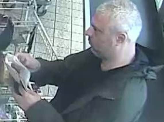 Police would like to speak to this man about the theft in Banbury Aldi. Photo: Thames Valley Police