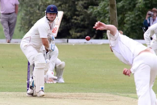 Banbury batsman Ed Phillips faces a delivery from Aston Rowants' Josh Smith at White Post Road. Photo: Steve Prouse