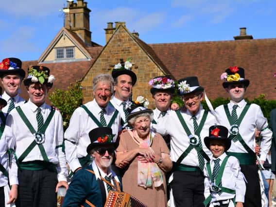 The Adderbury Village Morris Men (AVMM) with 101-year-old Evelyn Phillips (centre) at the Wardington Fete.