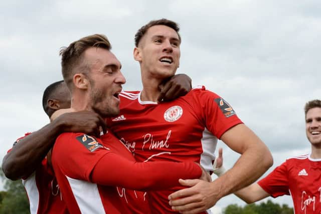Brackley Town goalscorer Matt Lowe celebrates with Shane Byrne after giving his side the lead against AFC Telford United. Photo: Jake McNulty