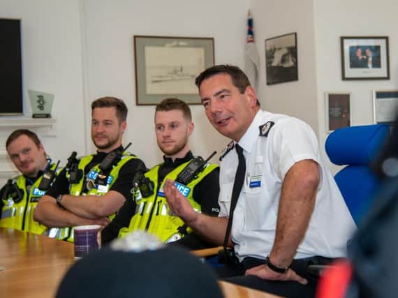 Northamptonshire Police Chief Constable Nick Adderley with officers
