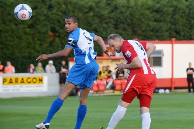 Brackley Town's Charlie Griffin loses out to Histon captain Remy Clerima