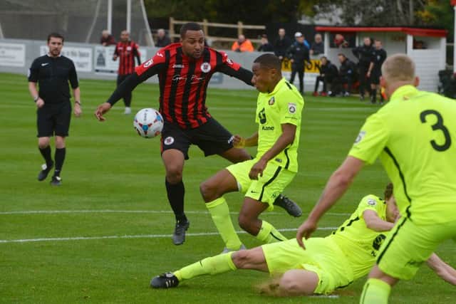 Brackley Town's Richard Batchelor has a shot charged down against  Gainsborough Trinity