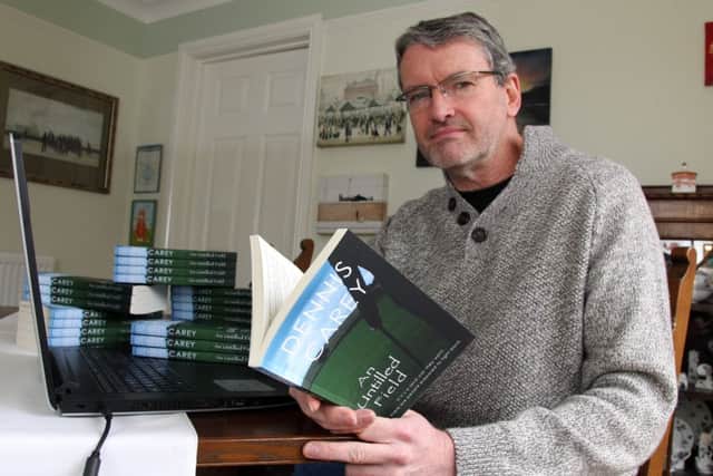 Author Dennis Carey with his second book An Untilled Field set in 1880's Country Mayo NNL-160123-192746009