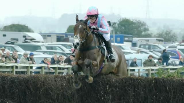 Good Egg and Sarah Thornton jump the last fence on their way  to winning the AGA Ladies Open