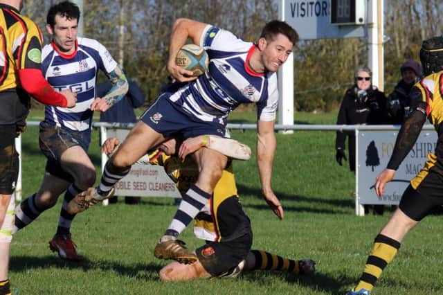 Adam Walsh is tackled during Banbury Bulls' victory against Droitwich at Bodicote Park
