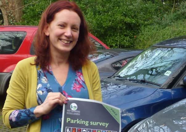 Claire Locke, Head of Shared Services (Environment) at West Oxfordshire District Council, with a poster publicising the parking survey. NNL-160902-150646001
