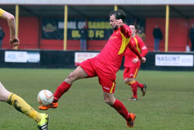 Mark Bell gives Banbury United the lead against North Leigh at Spencer Stadium
