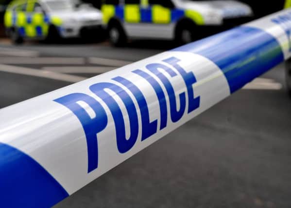 Police have arrested a 22-year-old woman after a racially aggravated public offence in Banbury.