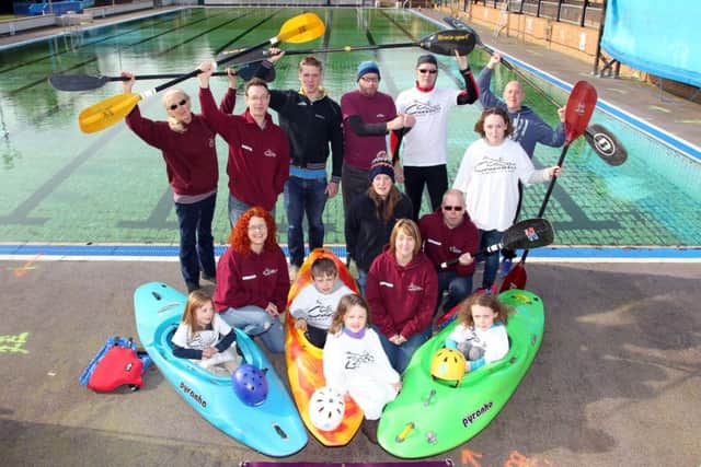 Members of Cherwell Canoe celebrate 20 years at Woodgreen Leisure Centre's outdoor pool NNL-160228-202916009