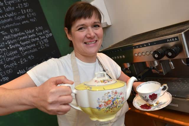 Vicky Wills pours a cuppa at the Chipping Norton Tea Set.