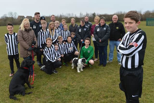 Sam Capel of Halse United has organized a 24 hour footbal match for Sport Relief at Brackley Leisure Centre. Sam Capel, right, Nicky Jones of The Chequered Flag pub is staying open, 4th from right, Becky Capel, 3rd from right and Brian Taylor, chair, South Northants Leisure Trust, 2nd from right, with coaches, parents, Halse united players and supporters. NNL-160315-181811009