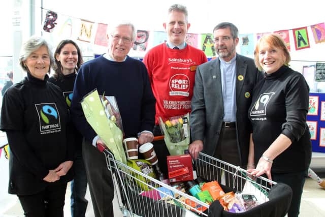 Countryfile presenter and Banbury Fairtrade member John Craven in Sainsbury's as part of Fairtrade Fortnight. Pictured l-r, Enid Frost, Libby Knox, John Craven, Tony Haskell, Rev Chris Eddy, Virginia Yip NNL-160314-083157009