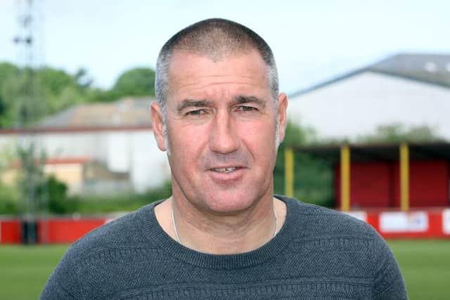 Banbury United manager Mike Ford is covering all bases