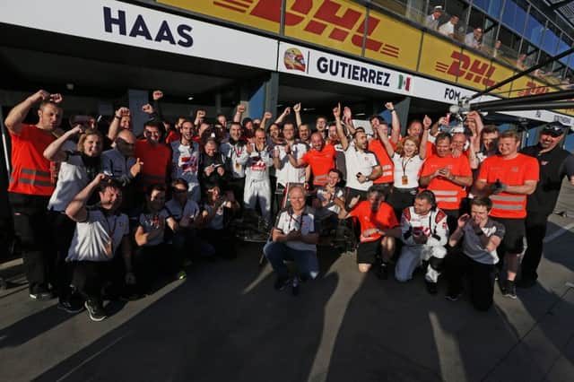 Banbury's Haas F1 Team celebrate Romain Grosjean's finish at the Australian Grand Prix NNL-160324-104121002