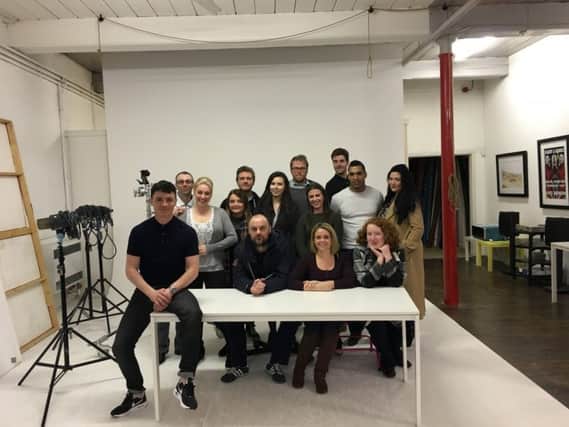 Actor Jody Latham is doing two workshops in Banbury on April 16 and 17. He is pictured here with students at his drama school in Manchester. NNL-160324-122714001