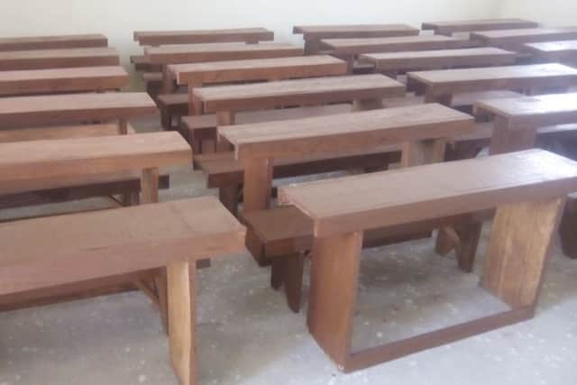 The new desks at the Good News Community School in Sierra Leone. NNL-160329-171411001