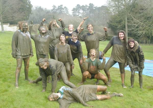 Participants in the Tudor Hall Mud Run. NNL-160604-093839001
