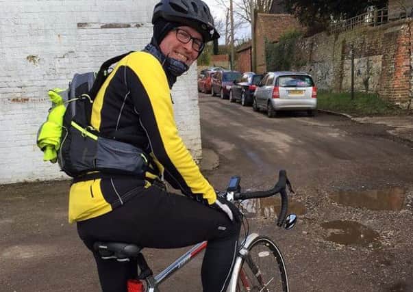Banbury printer John Assheton on his bike for a young homeless project