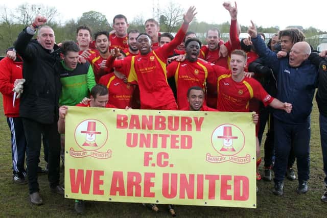 Banbury United celebrate promotion after their victory over Taunton Town at Spencer Stadium