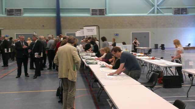 Volunteers frantically count the votes for the CDC and Banbury Town Council elections NNL-160605-165852001
