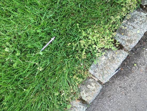One of the syringes found scattered around Bodicote. NNL-160518-151158001