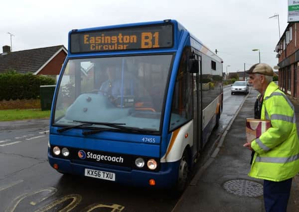 The B1 bus in Beaconsfield Road, Easington. Bus route activist, Roger Reynolds, about to get on. NNL-160531-154520009