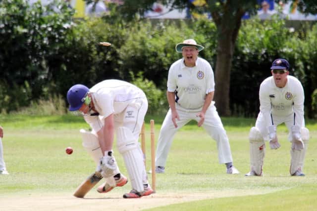 Westbury batsman Tom Gurney is out much to the delight of Brackley wicket-keeper Mike Cartwright and slip Keith Cartwright