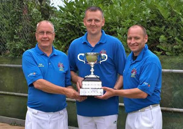 Keith Holloway, AJ Docherty and Darren Sharpe with the OBA Triples trophy