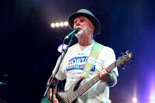 Dave Pegg in the Keep the Horton General campaign tee shirt at Fairport's Cropredy festival NNL-160815-144353001
