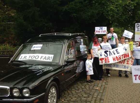Edd Frost & Daughters' hearse positioned outside St Mary's Church before the public meeting