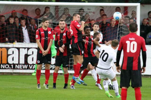 George Thompson goes close for FC United of Manchester at St James Park where Brackley Town emerged 1-0 victors
