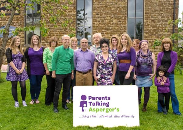 Karen Irvani (centre, purple and white) and the core PTA leadership team, with Lisa Bhanu and her son front right.

20160612       Copyright image 2016?Parents Talking Aspergers, For photographic enquiries please call Anthony Upton 07973 830 517 or email info@anthonyupton.com This image is copyright Anthony Upton 2016?.This image has been supplied by Anthony Upton and must be credited Anthony Upton. The author is asserting his full Moral rights in relation to the publication of this image. All rights reserved. Rights for onward transmission of any image or file is not granted or implied. Changing or deleting Copyright information is illegal as specified in the Copyright, Design and Patents Act 1988. If you are in any way unsure of your right to publish this image please contact +447973 830 517 or email: info@anthonyupton.com NNL-160109-160928001