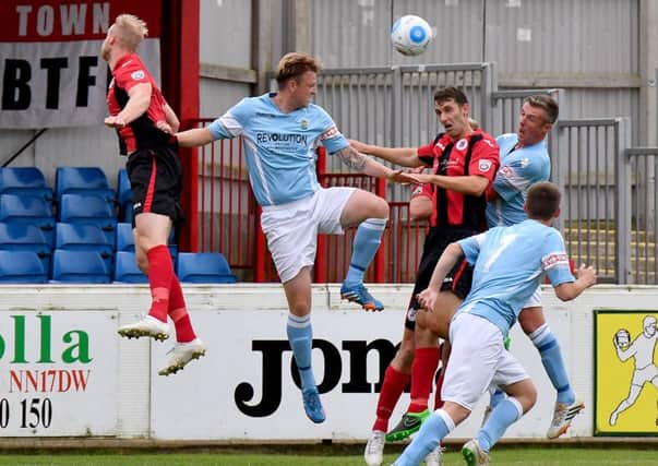 Brackley Town are foiled this time against Rugby Town in Saturday's FA Cup tie. Photo: Martin Pulley