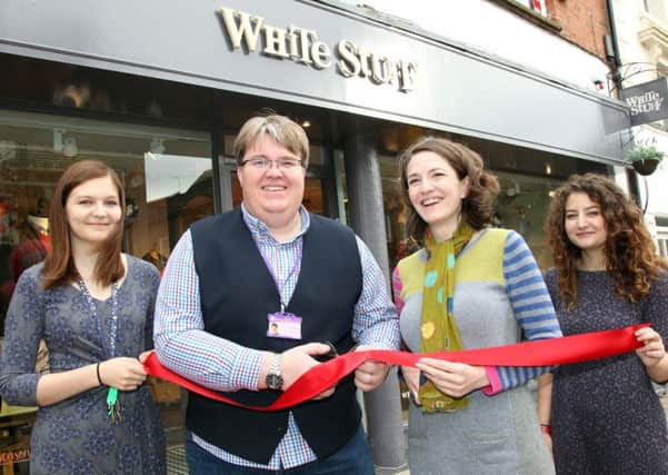 Tim Tardby-Donald cuts the ribbon to open White Stuff store on High Street with Store Manager Susie Barras and staff Beth Blakeley and Katie Gray NNL-160925-100715009
