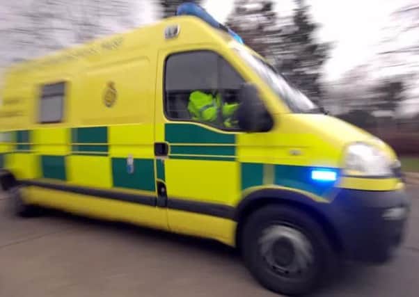 The woman was treated for leg injuries and chest pain before being taken to East Surrey hospital by road