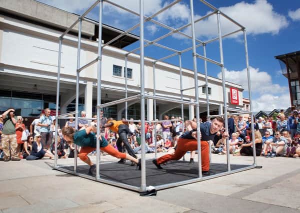 Captive is a highly energetic piece performed by four dancers inside a large cage